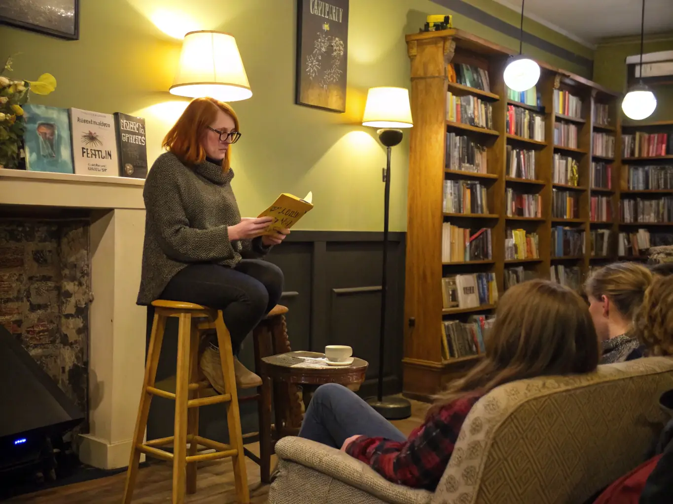 A cozy setting at a literary event, featuring an author engaging with the audience during a book reading. The image conveys the intimate and intellectual atmosphere of the event.